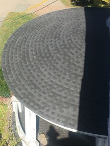 Shingles work on a round front porch (1)